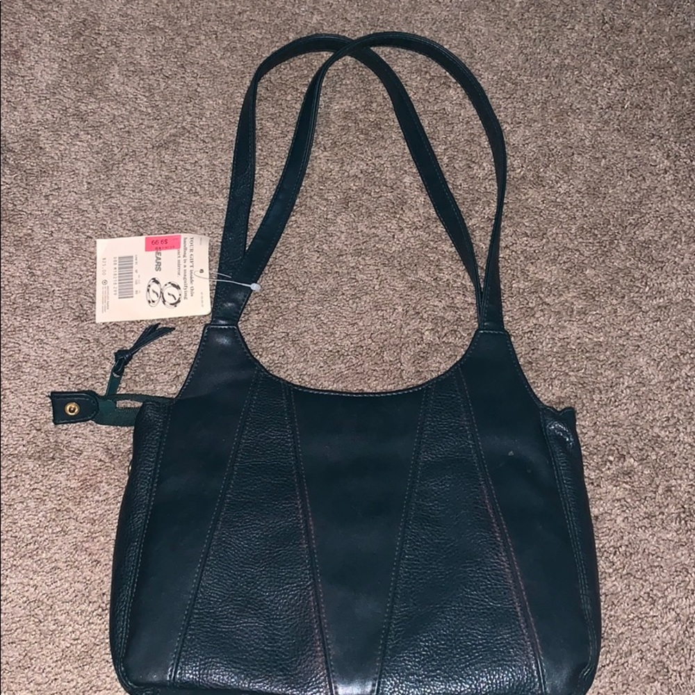 Dark green purse with cosemtic mirror